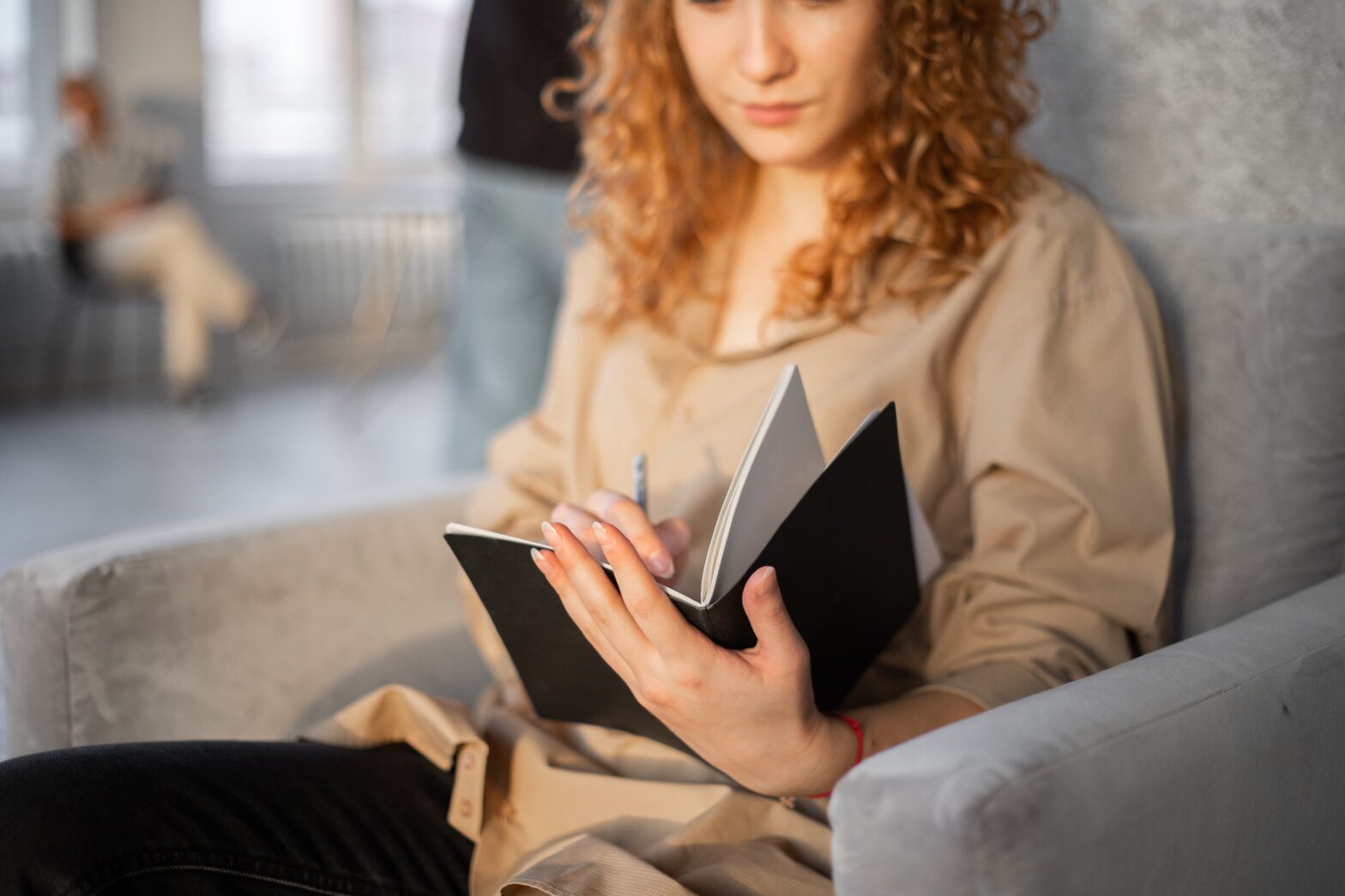 Woman with notepad